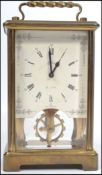 A 20th century German brass cased glass panel carriage clock by Schatz and Sohne having a two