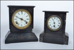 Two early 20th century black marble slate mantel clocks, one by Ansonia of America, having faceted