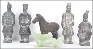 A vintage Oriental Chinese part Terracotta army consisting of soldiers and horse along with a jade