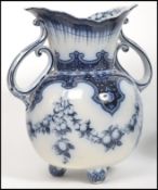 A 19th century Doulton Burslem large twin handled ceramic planter vase / water jug decorated in