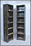 A pair of original mid 20th century slim Industrial  green enamel metal sectional cubby cabinet. The