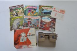 A vintage 20th century retro View-Master slide viewer complete in original box along with a quantity