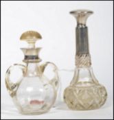 Two vintage 20th century silver hallmarked and cut glass perfume bottles with stoppers to include