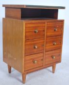 An unusual early 20th century Industrial office filing index cabinet raised on tapering legs