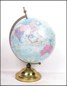 A vintage 20th century retro Globe Master globe raised on a brass circular base. Measures 48 cm