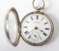 A silver hallmarked open faced key wind pocket watch marked for GA Baker & Sons of Gloucester. The
