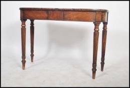 An 18th / 19th century Georgian flame mahogany side / console table being raised on reeded table