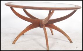 A vintage 20th century retro Victor Wilkins for G-Plan, a 1960's 'Spider' coffee table, the teak