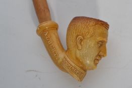 A early 20th century clay pipe with the bowl modeled as Albert of Belgium dating 1914 with