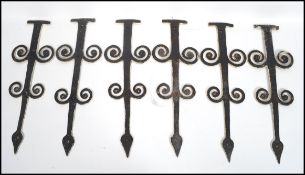 A set of six 19th century cast iron large country door furnishings of traditional form having