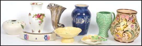 A collection of ceramics to include Art Deco pieces by Carlton Ware, Radford, Wade, Poole, Royal
