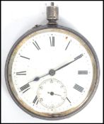 A gents silver hallmarked enamel faced pocket watch, Roman numeral chapter ring with subsidiary