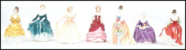 A collection of vintage Royal Doulton ceramic figures to include Sweet Sixteen HN3648, Deborah