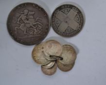 A group of pre decimal silver coins to include an 1820 Georgian crown, a one florin, and various