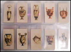 Cigarette Cards: An album of assorted vintage cigarette cards - all full sets. From a large