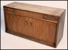 A mid century helix pattern sideboard possible by David Booth and Judith Ledeboer for Gordon