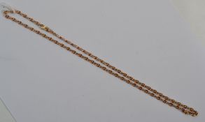 A 9ct gold necklace chain having an unusual dual ring link with lobster claw clasp, weighs 7.7