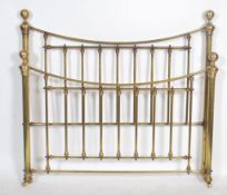 A contemporary John Lewis double bed brass form in the Victorian style with brass spherical