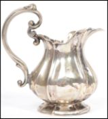 A silver hallmarked believed Hungarian jug pourer bearing Hungarian / possibly German mark 13 over