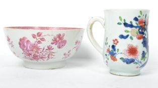 An 18th century Chinese ceramic European export bowl raised on circular foot with puce floral sprays