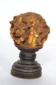 An unusual 20th century bronze seal with carved handle depicting mythical creatures, the seal