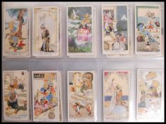 Cigarette Cards: An album of assorted vintage cigarette cards, all part sets / odds. From a large