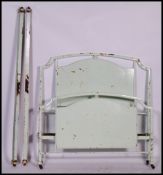 A vintage early 20th century Art Deco double bed. Constructed with a tubular frame with central