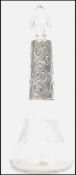 An early 20th century George V silver hallmarked and cut glass perfume bottle of tapering form