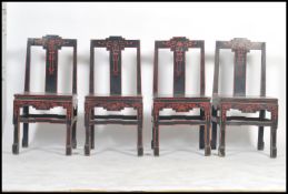 A good set of 4 believed 19th / 20th century Chinese dining chairs being black lacquered with red