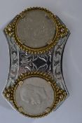 A 20th century unusual large silver white metal belt buckle with American 1977 coins in gilt