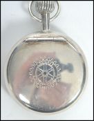 An Italian silver pill box in the form of a pocket watch having notation to front for Rotary