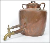 A late 19th century very large copper kettle, twin handles to the side with tap to centre, touch