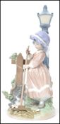 A Lladro ceramic figurine group entitled Fall Clean Up depicting a girl in bonnet  raking leaves