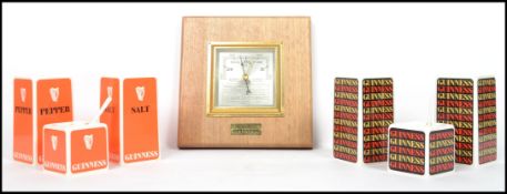 Two boxed retro sets of original Guinness three piece cruet sets in plastic together with a boxed