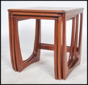 A G-Plan retro teak wood 1970's graduating nest of tables in the ' ASTRO ' pattern. The tables