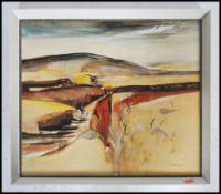 A framed oil on canvas painting of a barren Dartmoor landscape signed to the corner K.W. Doughty 72