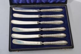 A cased set of six silver handled hallmarked tea knives. Birmingham assay mark with date letter V