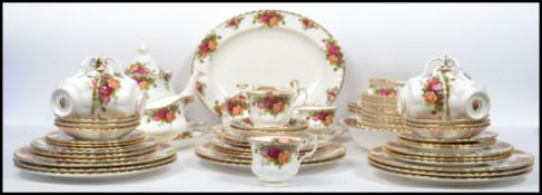 A 20th century Royal Albert old country roses tea and dinner service to include 8 dinner plates, 1