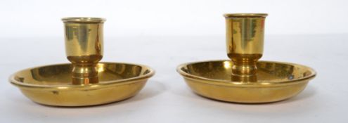 A pair of ' Brighton Bun ' travelling brass candle sticks, with screw action. Measure 8cms when