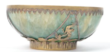 An Oriental Chinese carved green stone jade type bowl having an applied silver white metal