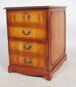 A Georgian style yew wood 2 drawer filing cabinet. Raised on plinth base with twin drawers having