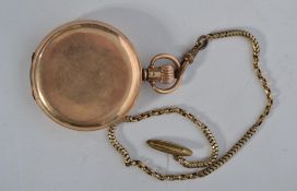 A 9ct gold hunter pocket watch having a crown winder and albert chain ( yellow metal ) The
