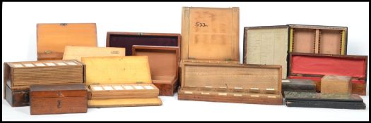 A collection of 19th and 20th century scientific wooden cases to include slide boxes, instrument