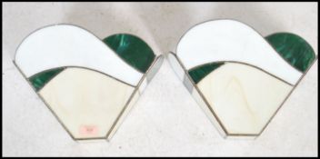 A pair of fluted stained and leaded, coloured glass wall sconce light fitment shades. Of wonderful