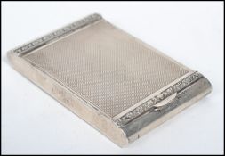 A silver hallmarked vintage ladies compact by Dyas Beverley Hampton of rectangular form having an