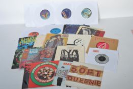 A collection of vinyl 7