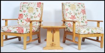 A pair of retro yew wood armchairs by Reynolds of Ludlow having Art Deco style splat backs, each