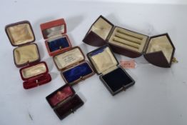 A group of antique jewellery boxes to include an Oxford Street triple bracelet box, Newport, Bristol