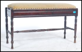 An early 20th century double / duet ebonised mahog