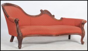 A good mahogany framed chaise longue sofa day bed, three seater sofa having a heavily carved